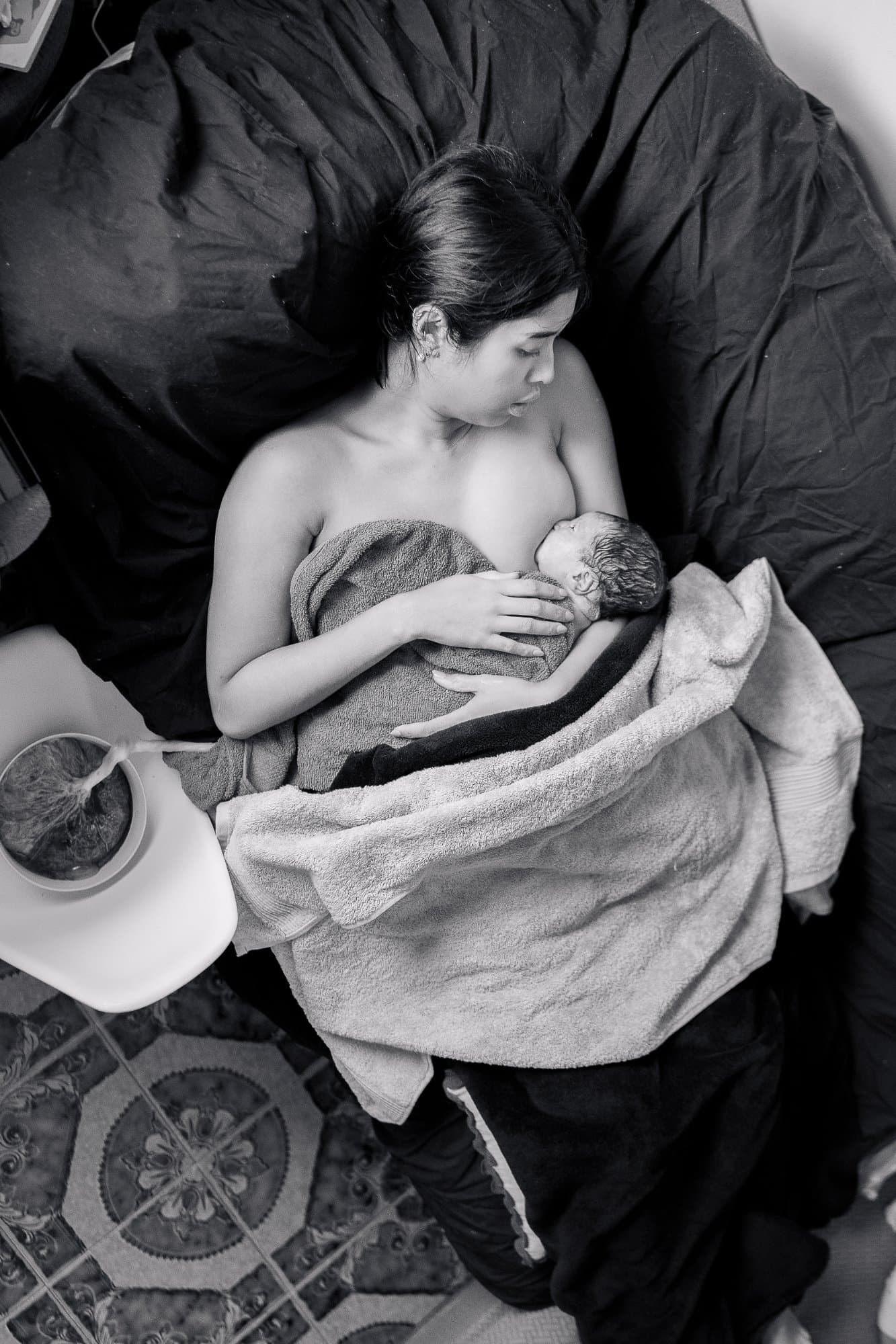 Baby breastfeeding on couch placenta